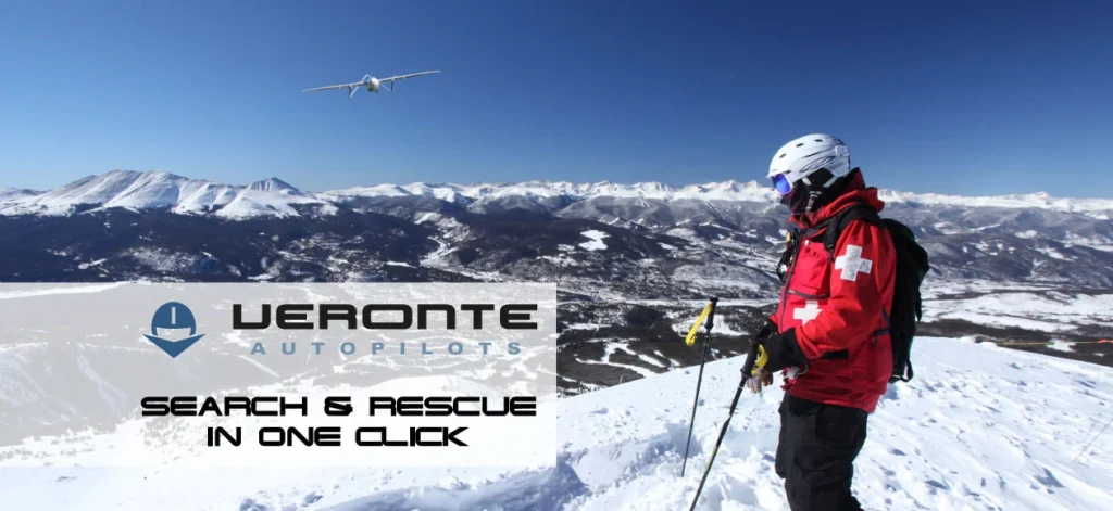 Drone flying over snowy mountains with a rescuer watching, branded with Veronte autopilots.