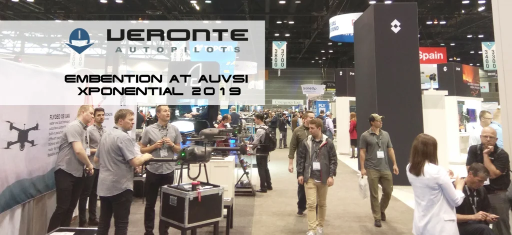 Embention at AUVSI Xponential 2019 showcasing drones with attendees and exhibits in a busy expo hall.