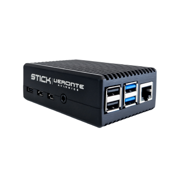 __STICK Compact black computer stick labeled 'STICK uAvionix' with multiple USB ports on one side and a ribbed, heat-dissipating surface.