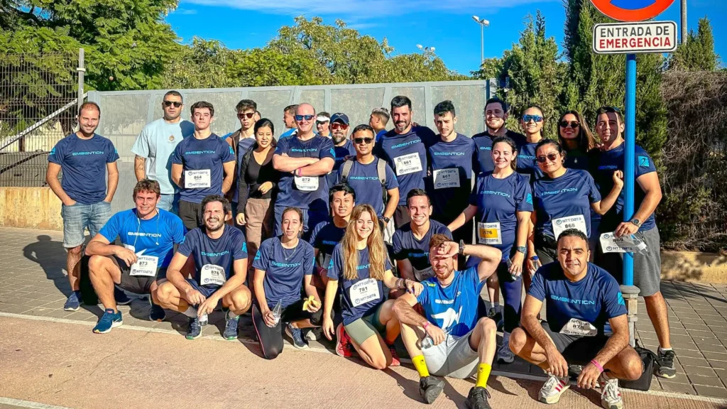 group of people from a company in a blue T-shirt