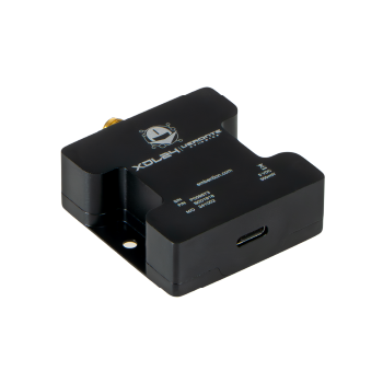 Veronte Ecosystem Black, flat rectangular electronic device labeled 'SDL Avionix' with a gold-plated SMA connector and a silver BNC connector, mounted on a base with screw holes for installation